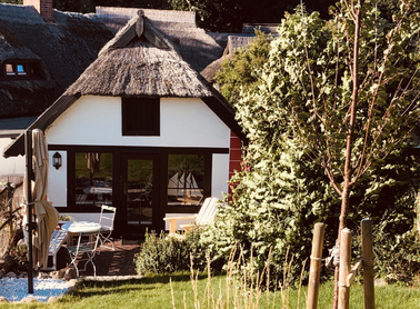 Urlaub Vitt Ferienhaus Wohnzimmer Parkett